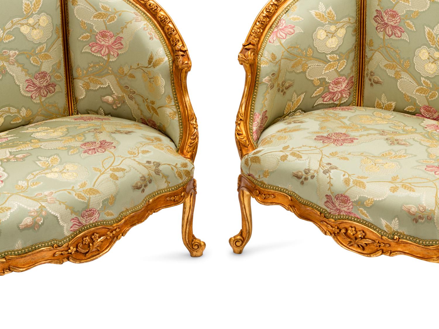 A Pair of Louis XV Style Giltwood Sofas