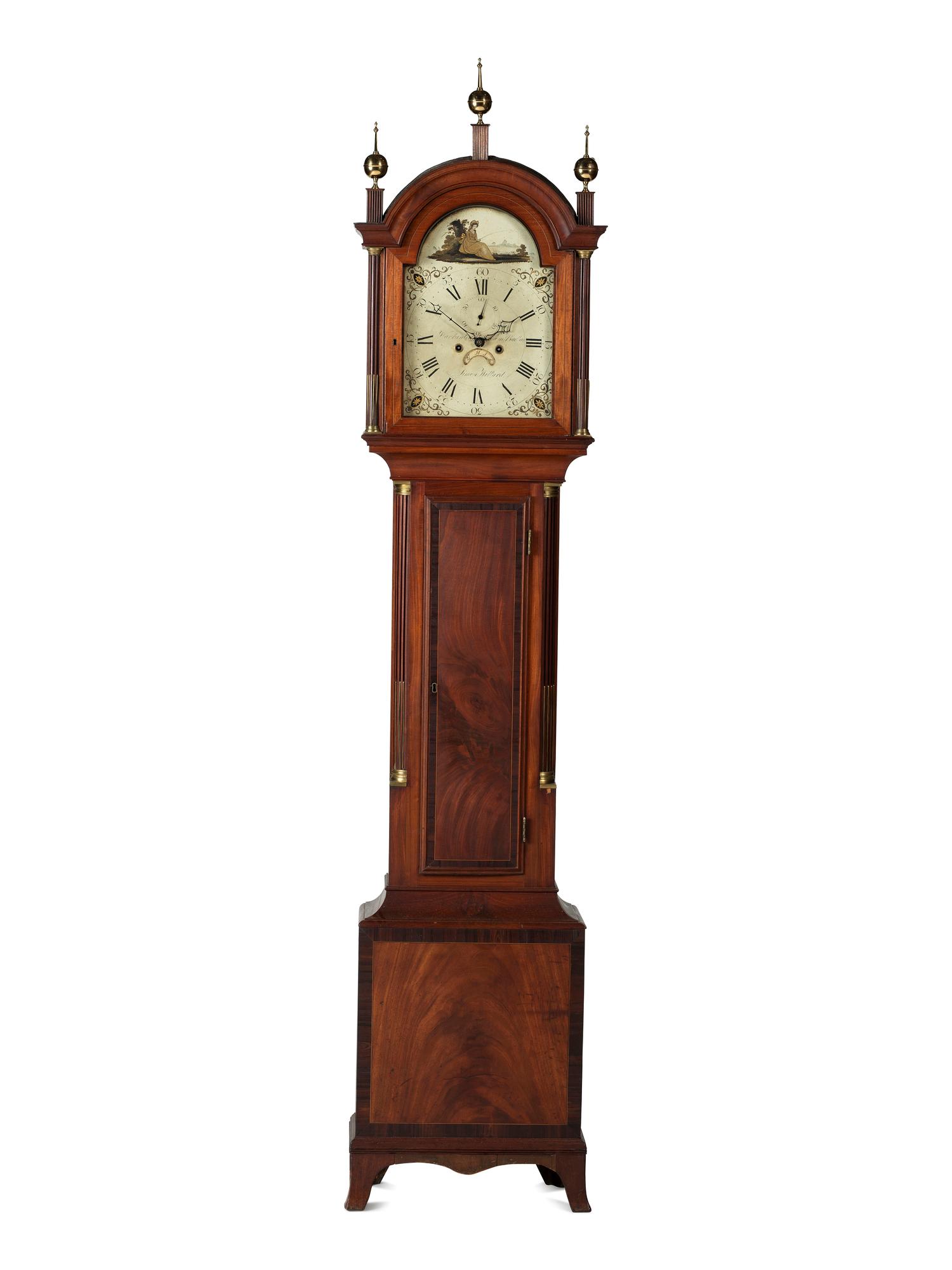 A Federal Carved and Inlaid, Brass-Mounted Mahogany Tall Case Clock