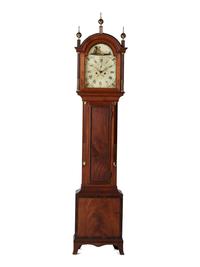 A Federal Carved and Inlaid, Brass-Mounted Mahogany Tall Case Clock