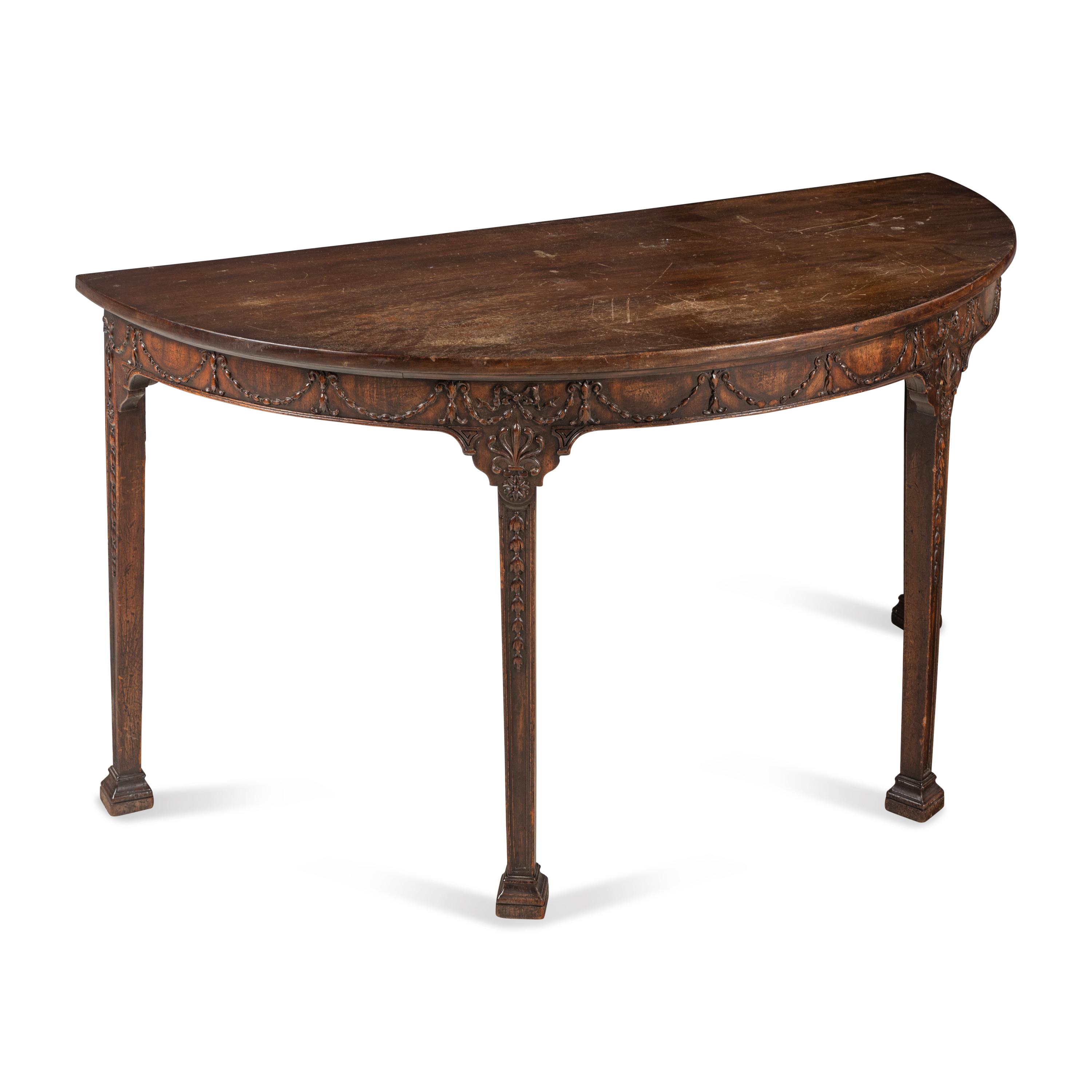 A Pair of George III Style Carved Mahogany Demilune Console Tables