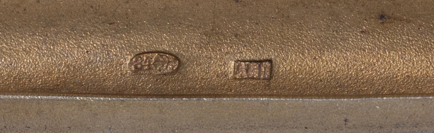 A Russian Silver Cigarette Case, Maker's mark obscured, assay mark of Ivan Lebedkin, Moscow, the lid with raised decoration showing a w