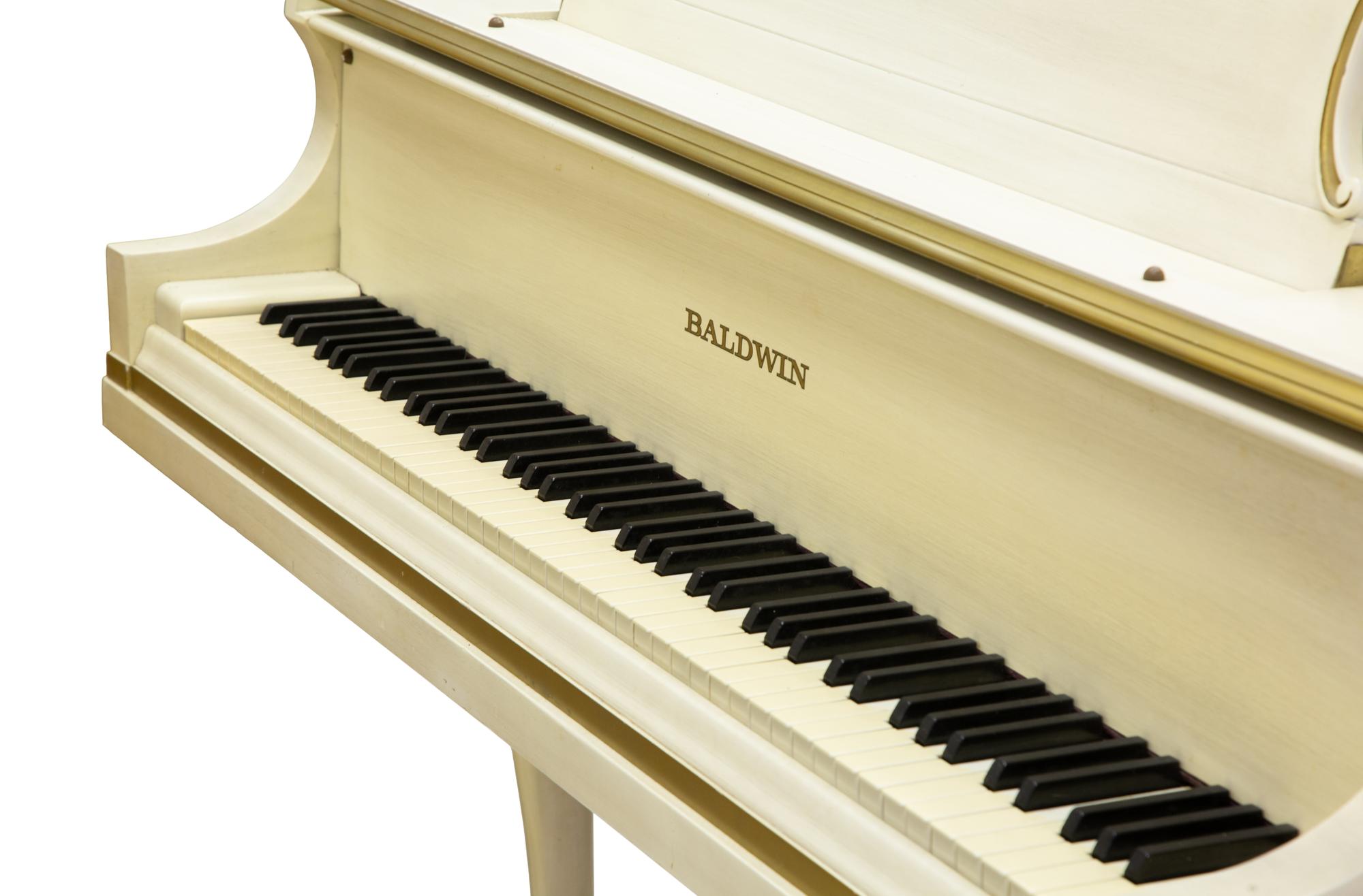 A Baldwin White Painted and Parcel Gilt Baby Grand Piano