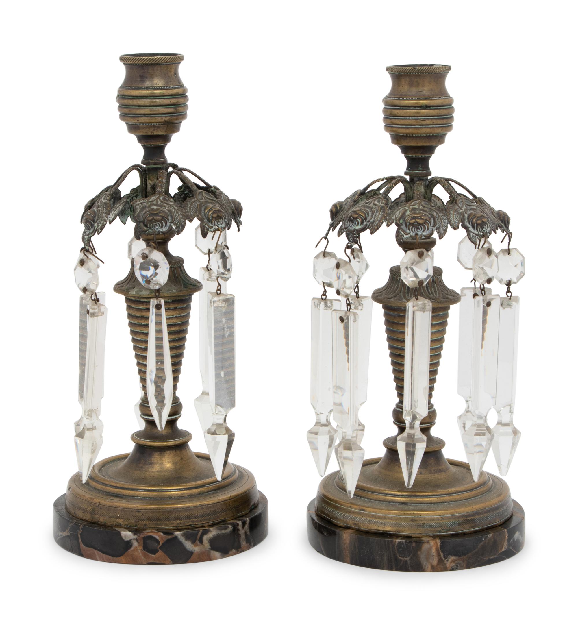 A Pair of Regency Style Gilt Metal and Glass Candlesticks
