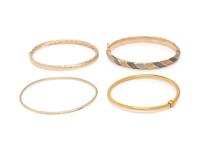 COLLECTION OF GOLD BANGLE BRACELETS