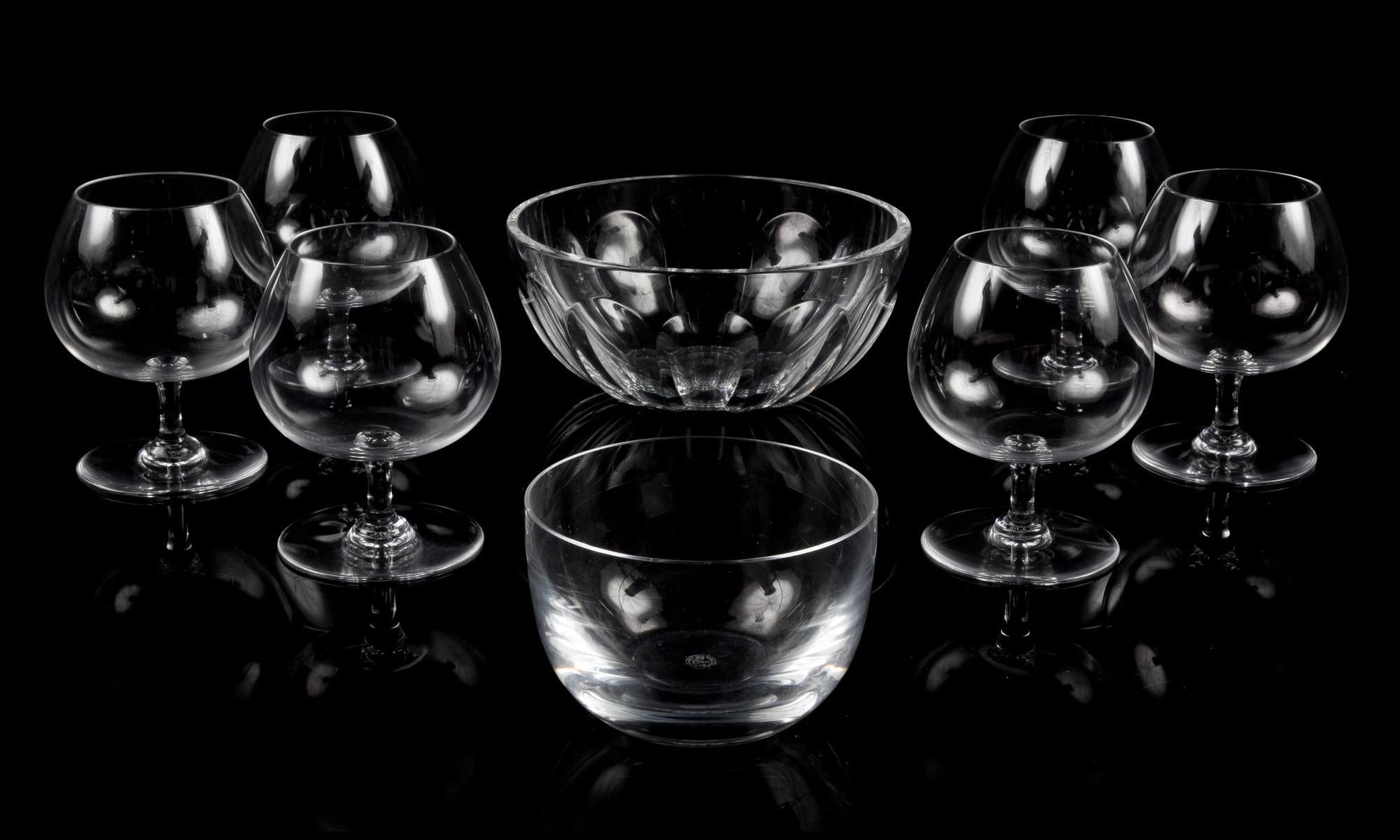 A Set of Six Baccarat Glass Cordial Snifters Height of snifters 4 5/8 inches.