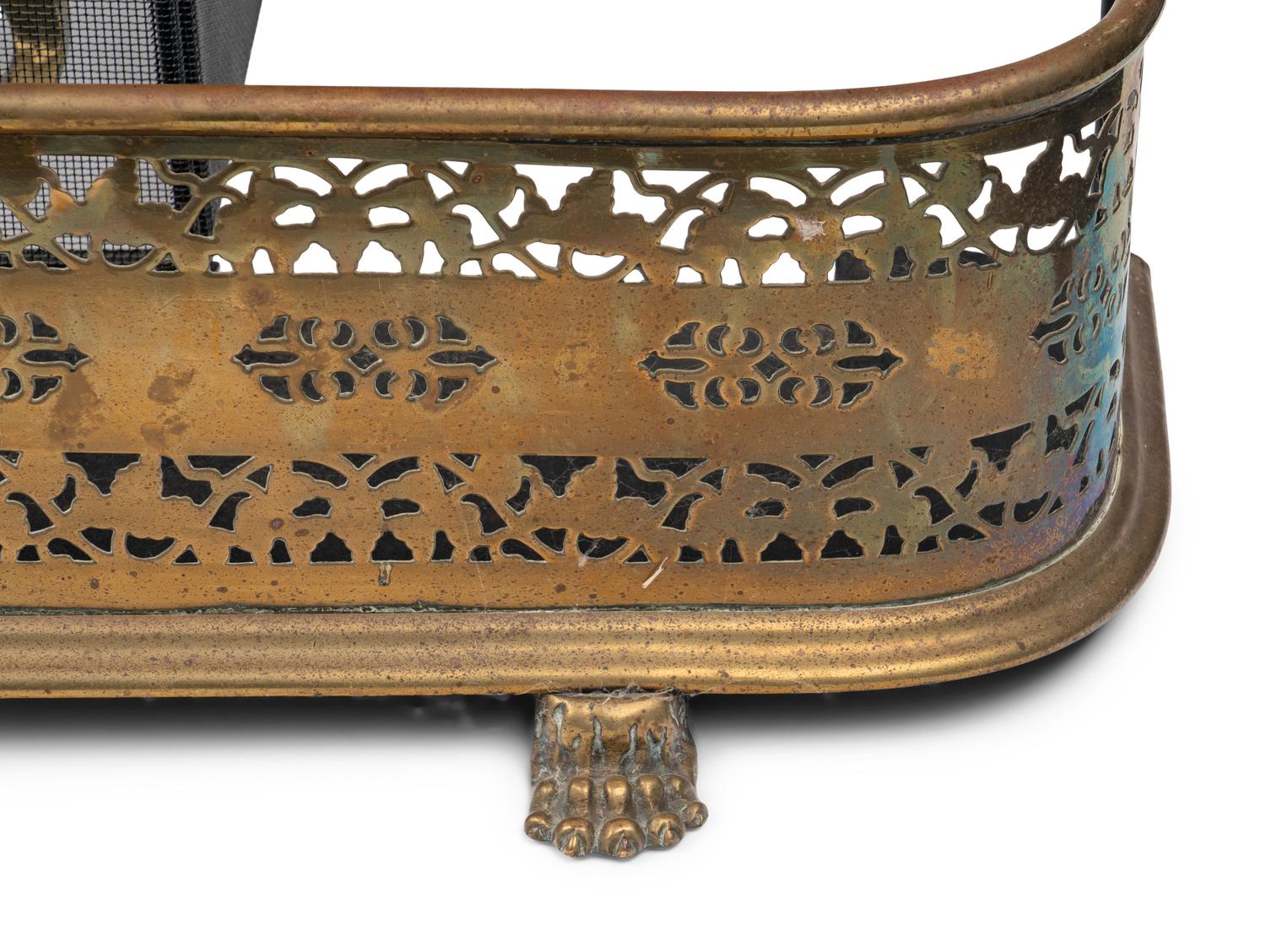 An English Brass Fireplace Fender and Pair of Andirons