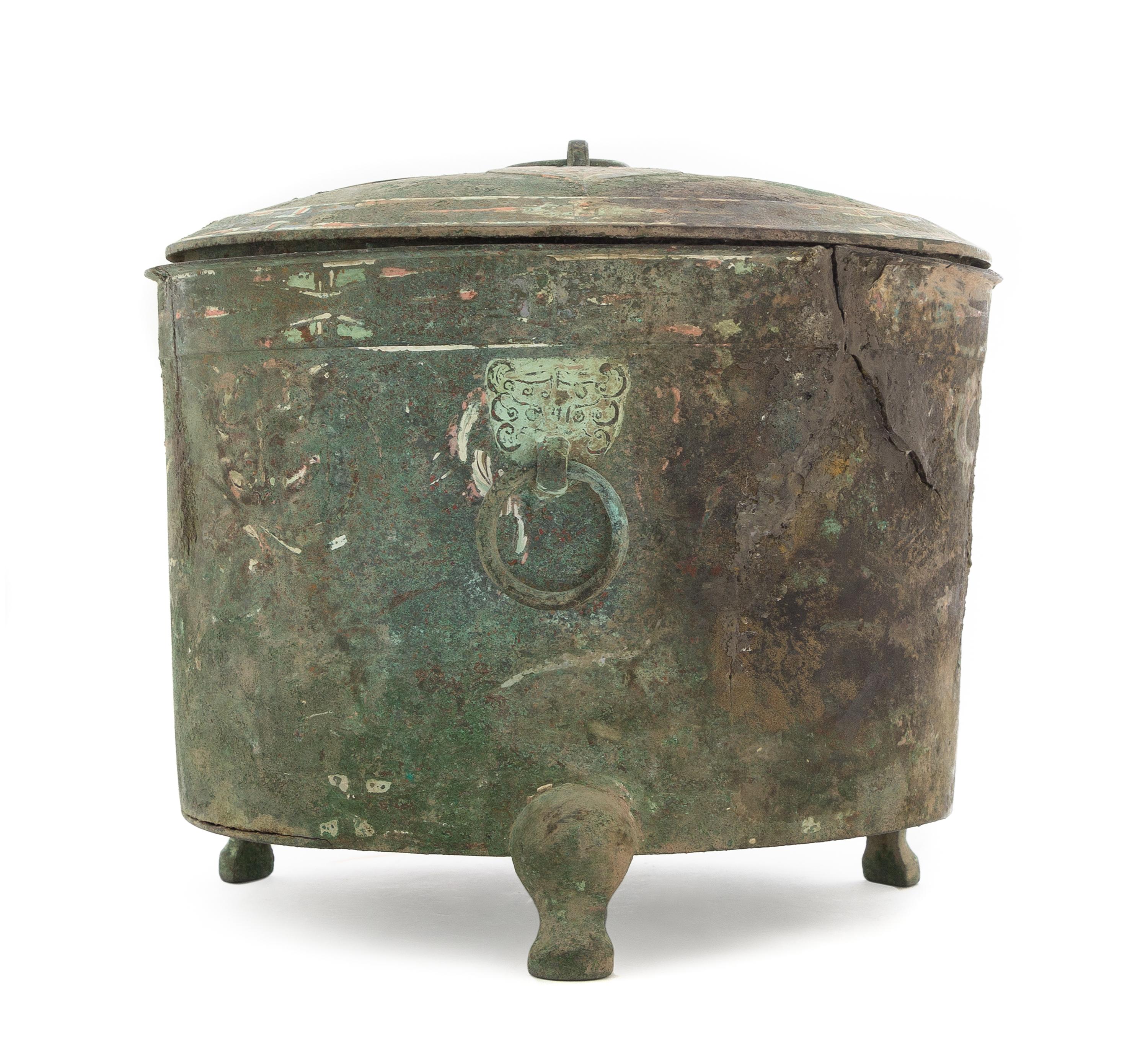 A Chinese Painted Bronze Tripod Vessel, Lian Height 8 1/2 inches. — HAN DYNASTY (206 B.C. - A.D. 220)