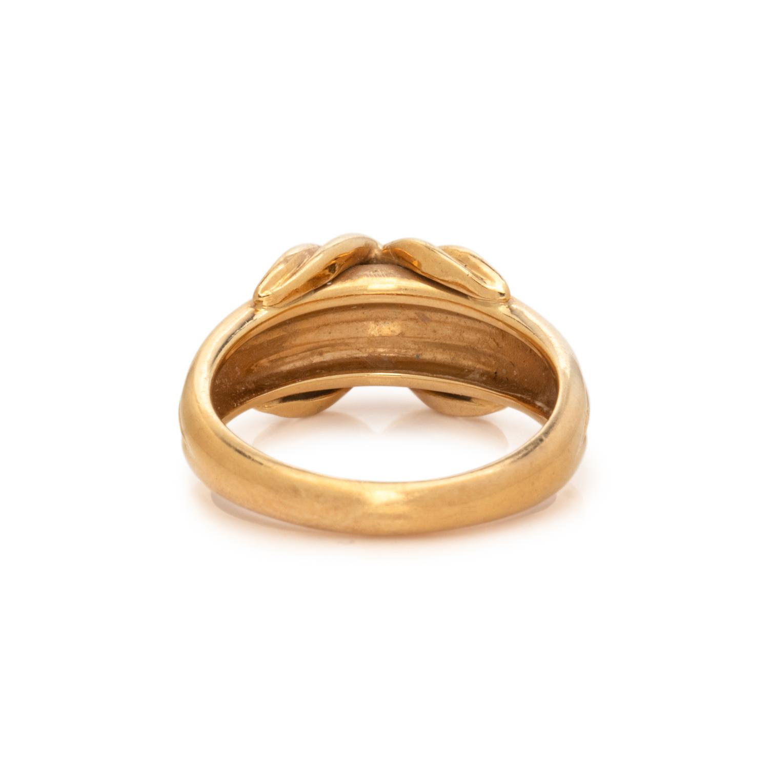 TIFFANY & CO., YELLOW GOLD 'SIGNATURE X' RING