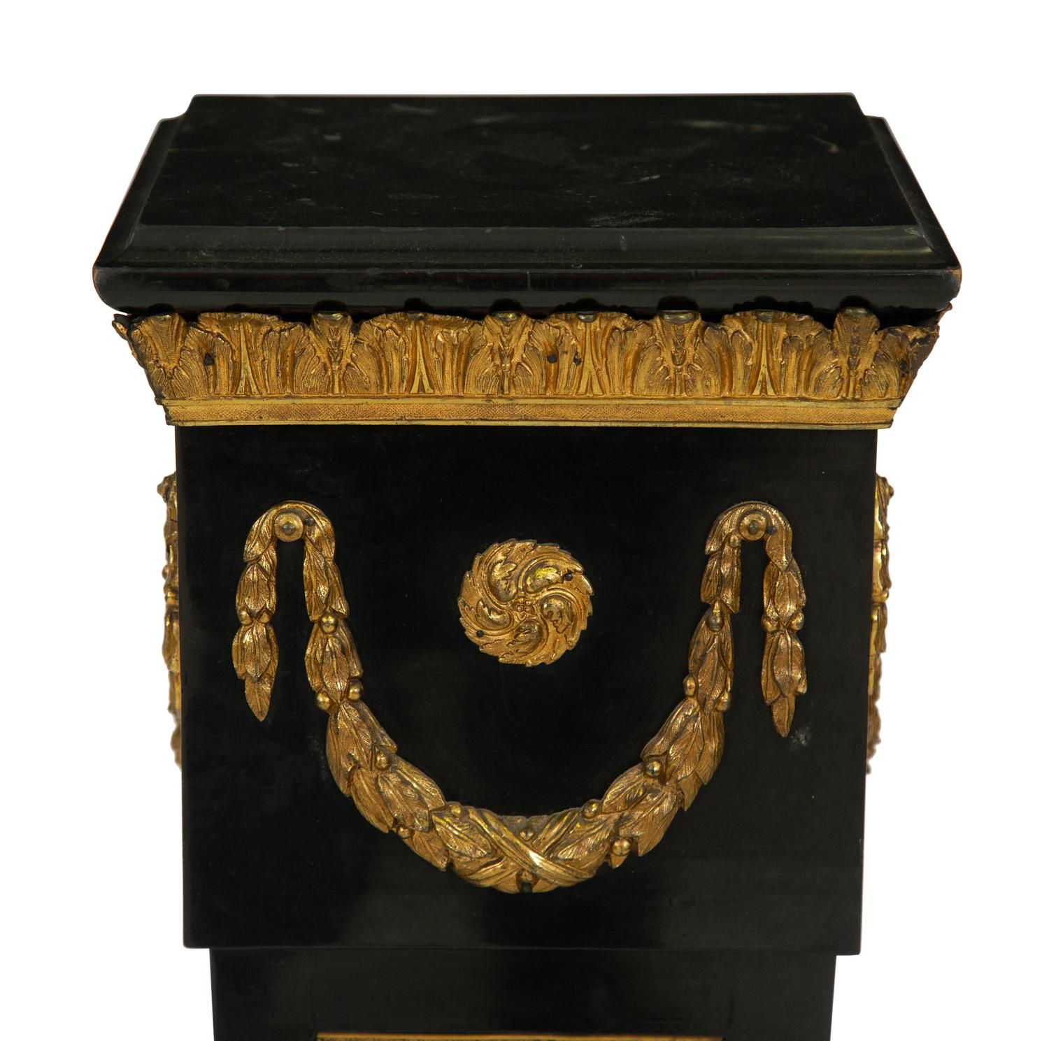 A Napoleon III Style Gilt Bronze Mounted Ebonized Pedestal