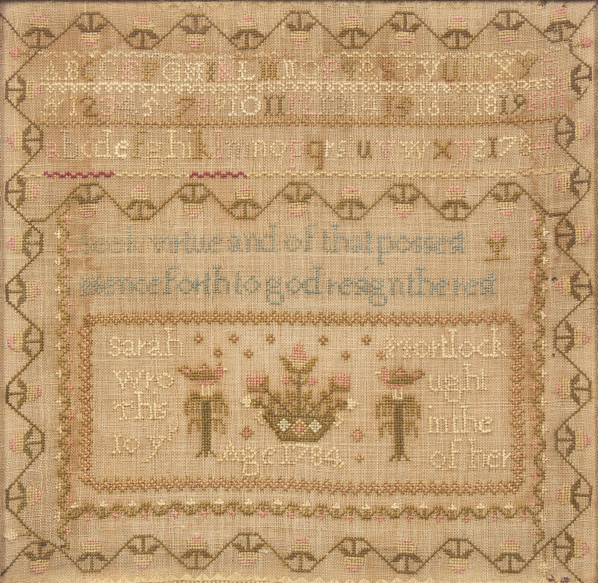 A Needlework Sampler and a Needlepoint Picture of a Hound