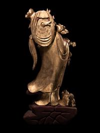 A Chinese Gilt Lacquered Wood Figure of Immortal
