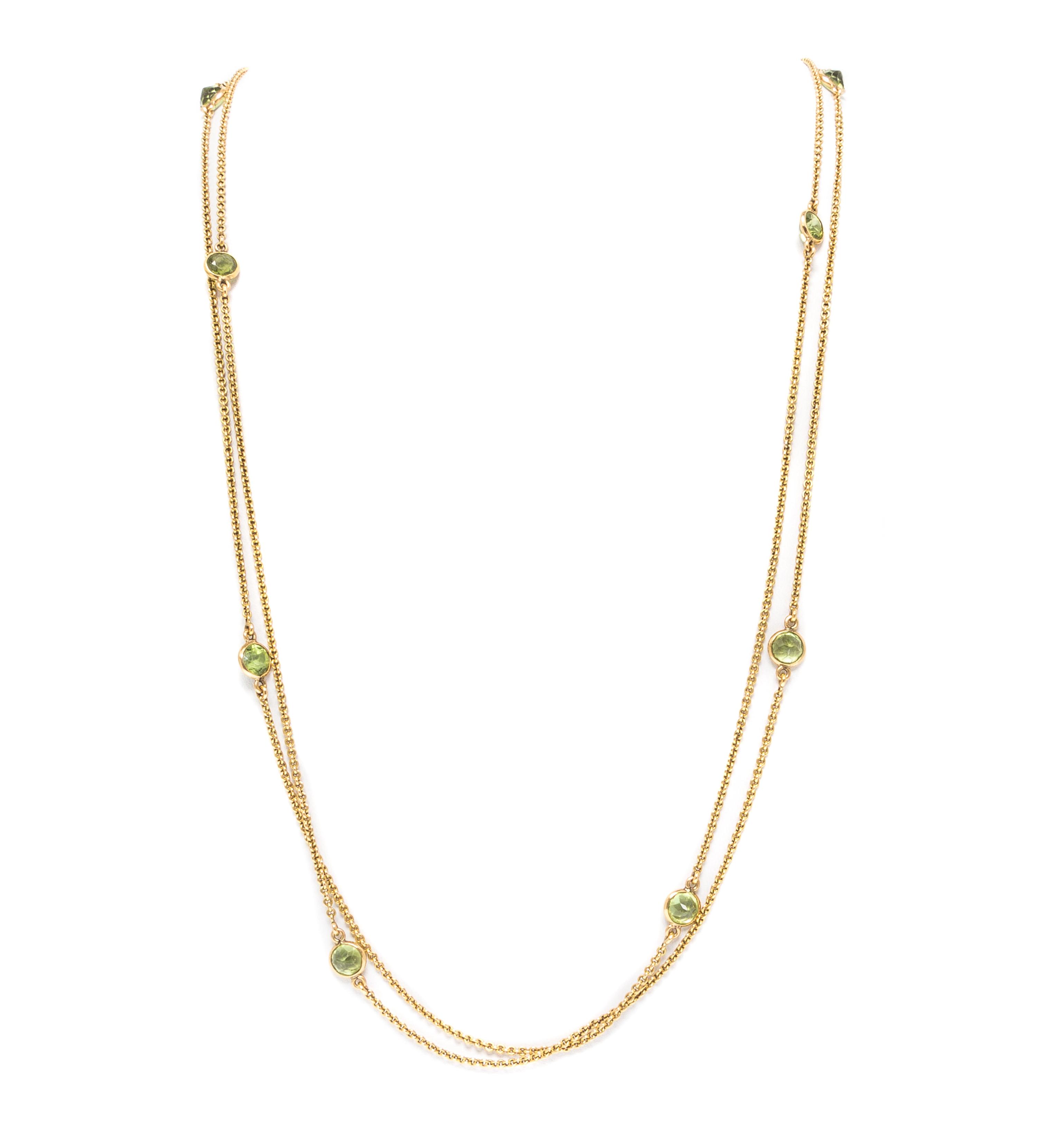 An Antique 14 Karat Yellow Gold and Peridot Longchain, 12.40 dwts.