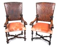 A Pair of Renaissance Revival Style Mahogany Open Armchairs Height 50 x width 25 x depth 24 inches. — 20TH CENTURY
