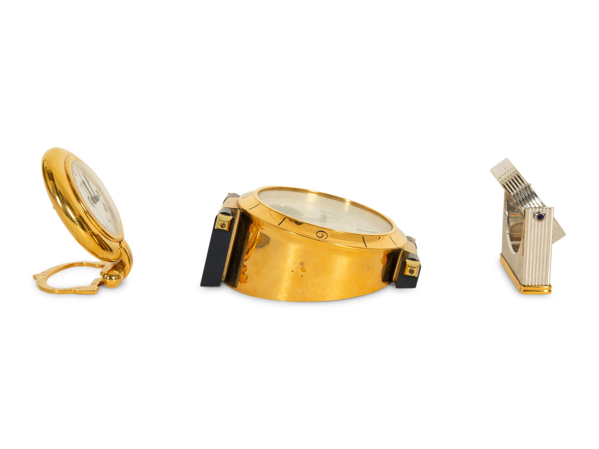 Three Cartier Desk Clocks — 20th Century