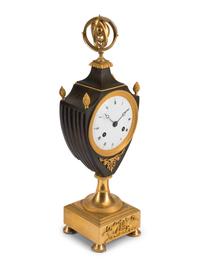 An Empire Gilt and Patinated Bronze Clock Garniture