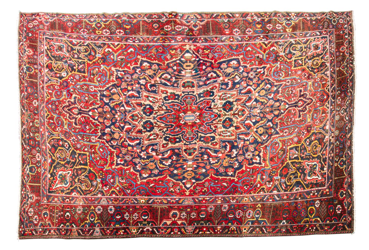 A Bahktiari Wool Rug 13 feet 4 inches x 10 feet 8 3/4 inches.