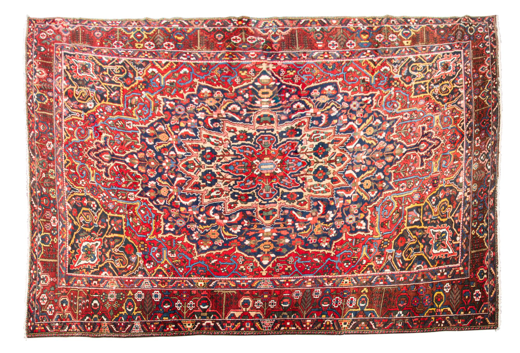 A Bahktiari Wool Rug 13 feet 4 inches x 10 feet 8 3/4 inches.