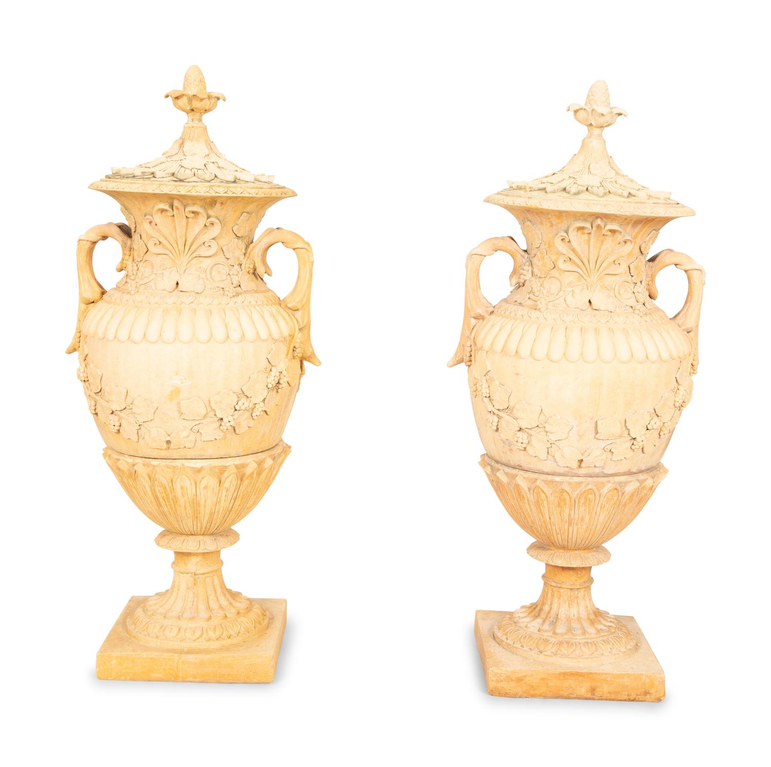 A Pair of Cast Terra Cotta Covered Garden Urns on Painted Wood Pedestals