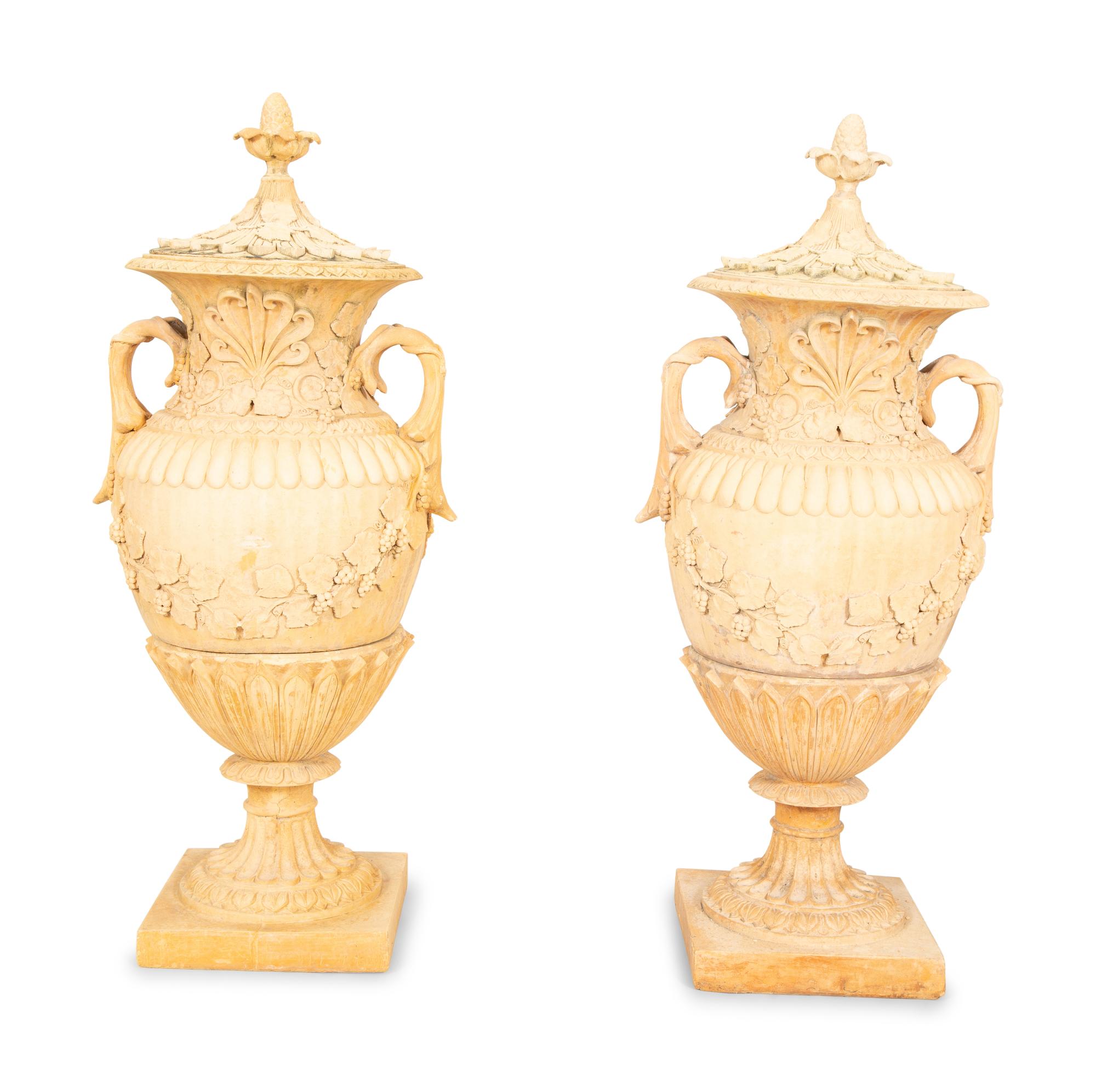 A Pair of Cast Terra Cotta Covered Garden Urns on Painted Wood Pedestals