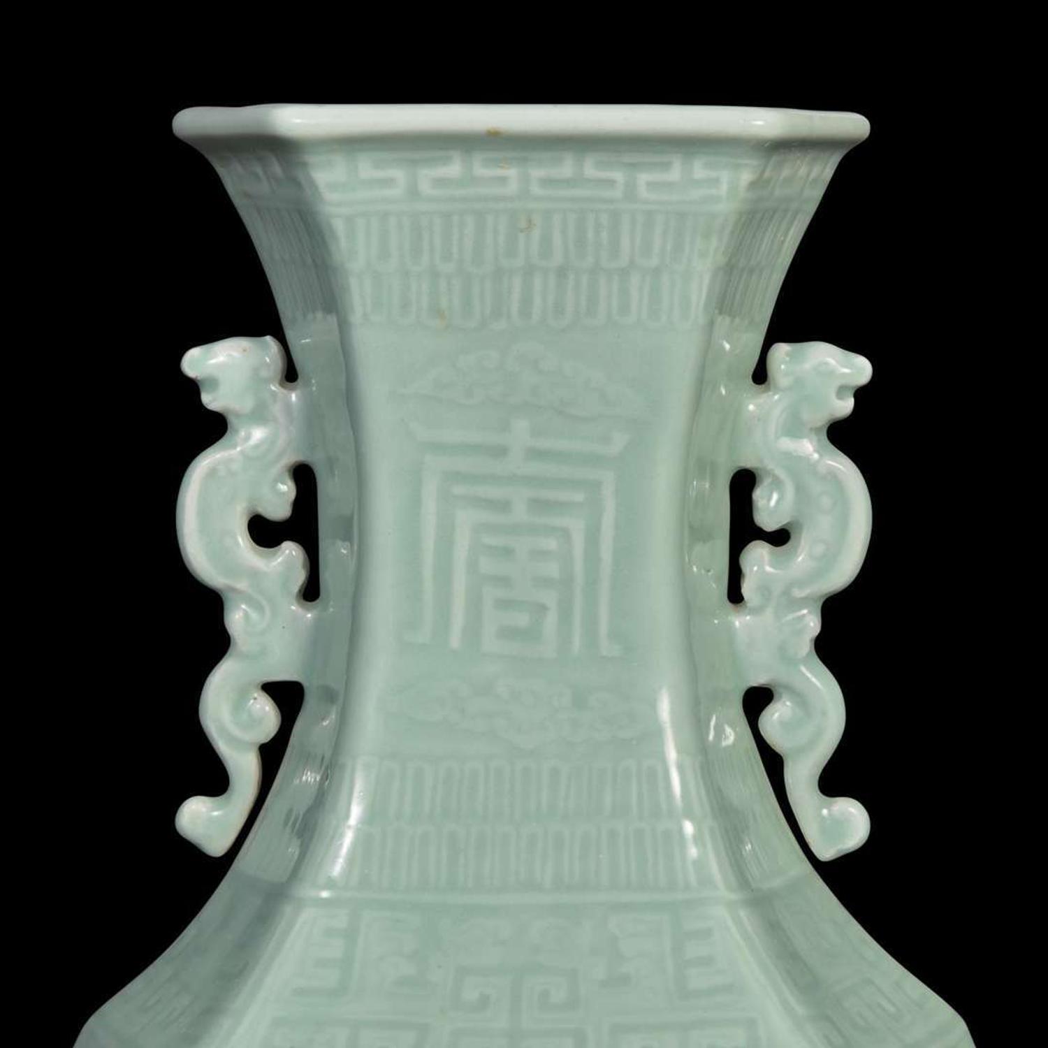 A Chinese celadon-glazed hexagonal baluster vase 青釉双耳六方瓶