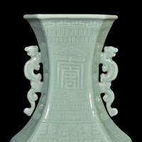 A Chinese celadon-glazed hexagonal baluster vase 青釉双耳六方瓶