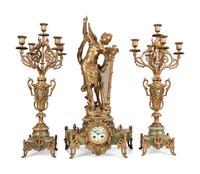 A Neoclassical Gilt Metal and Onyx Clock Garniture