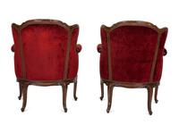 A Pair of Louis XV Style Walnut Bergères