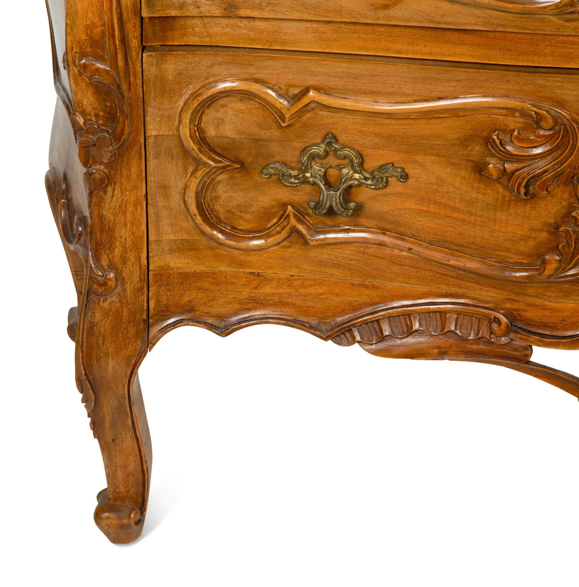 A Louis XV Provincial Style Walnut Commode