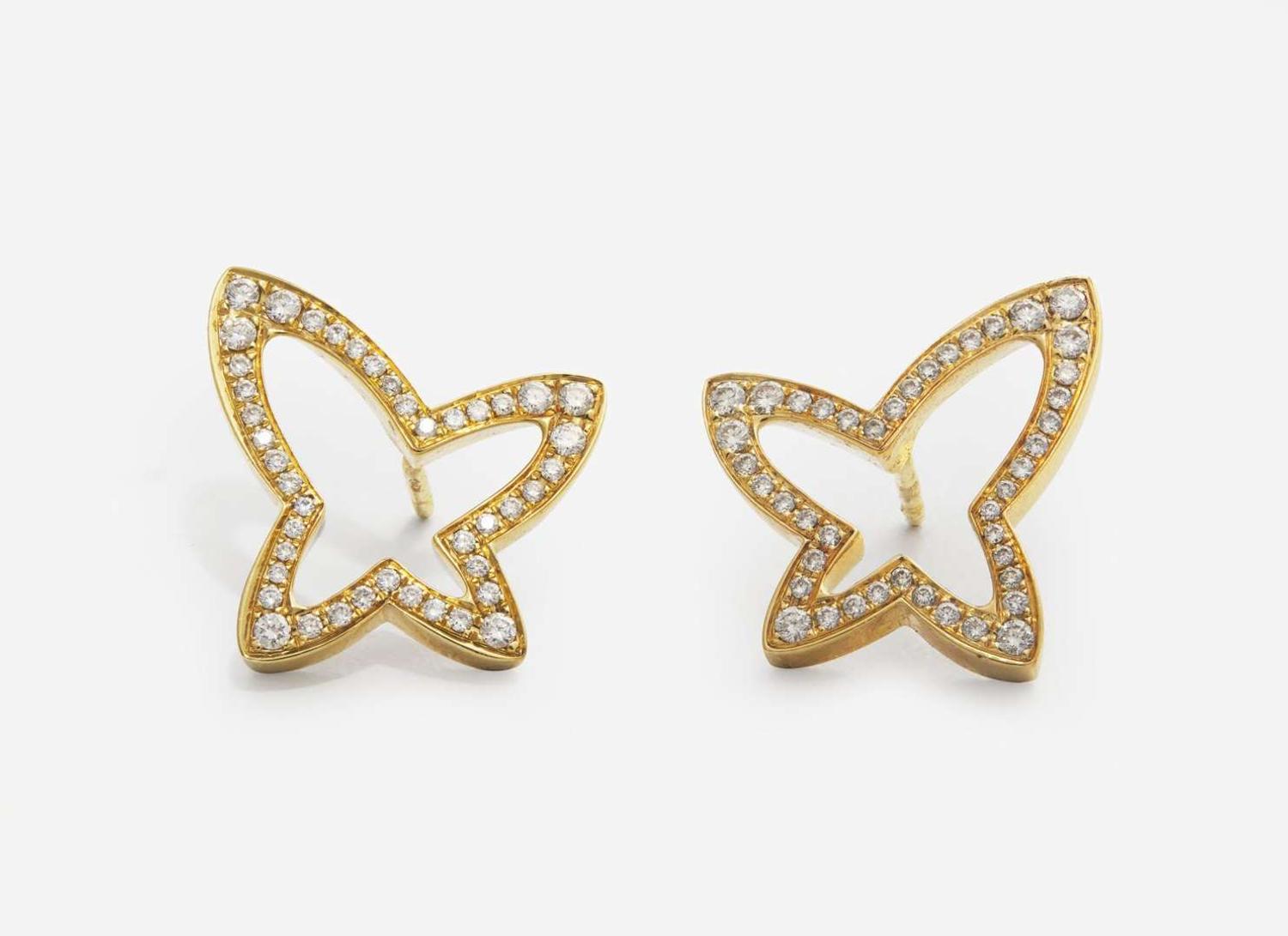 An 18K Yellow Gold Earrings and Necklace Set by Movado