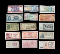 A Large Collection of International Coins and Paper Money