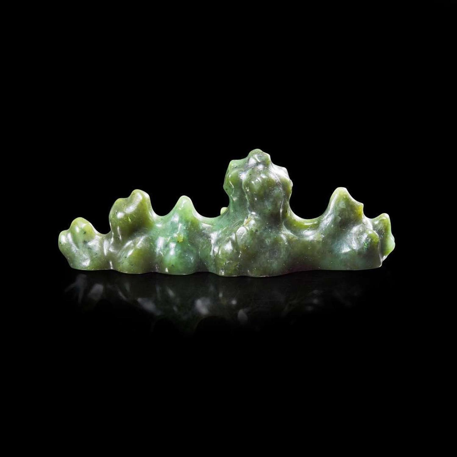 A Chinese carved spinach jade "Mountain" brush rest 菠菜綠玉筆架