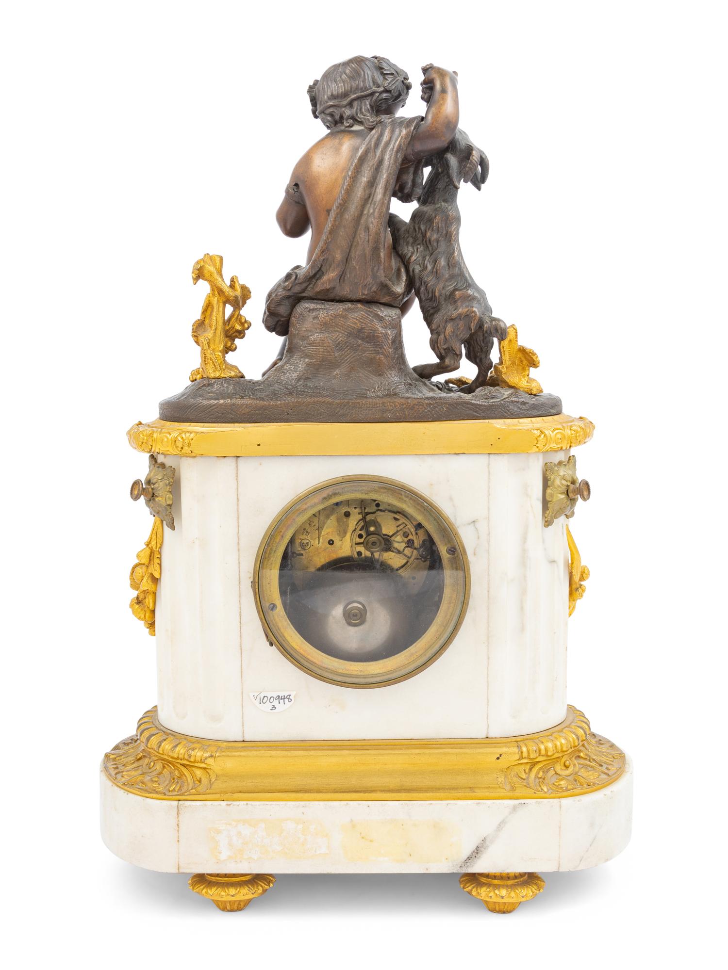A French Bronze and Marble Clock