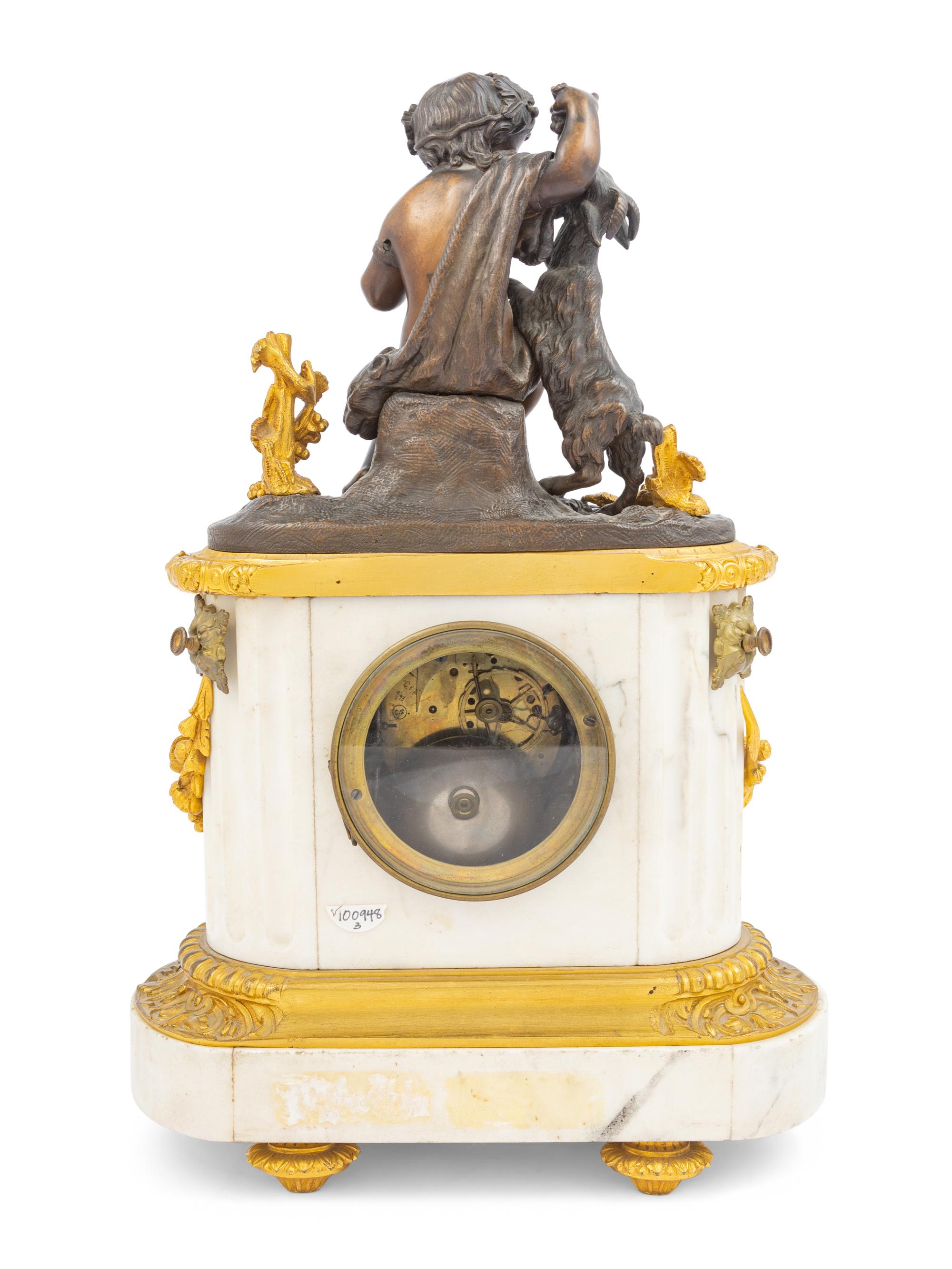 A French Bronze and Marble Clock