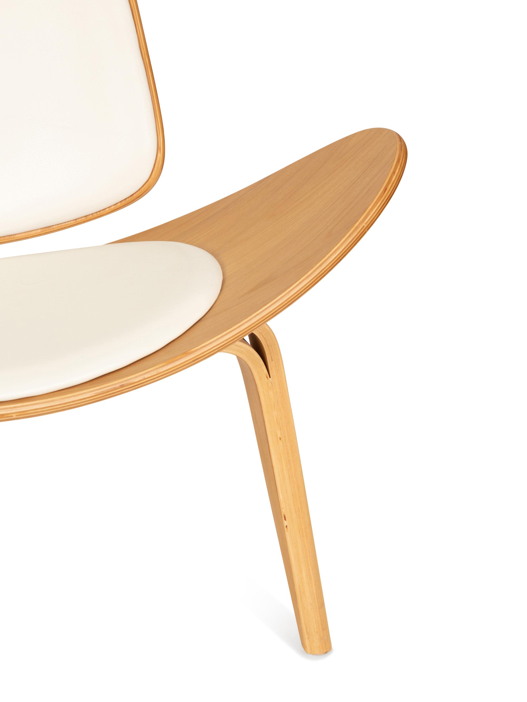 A Pair of Italian Walnut and Leather Tripod Chairs