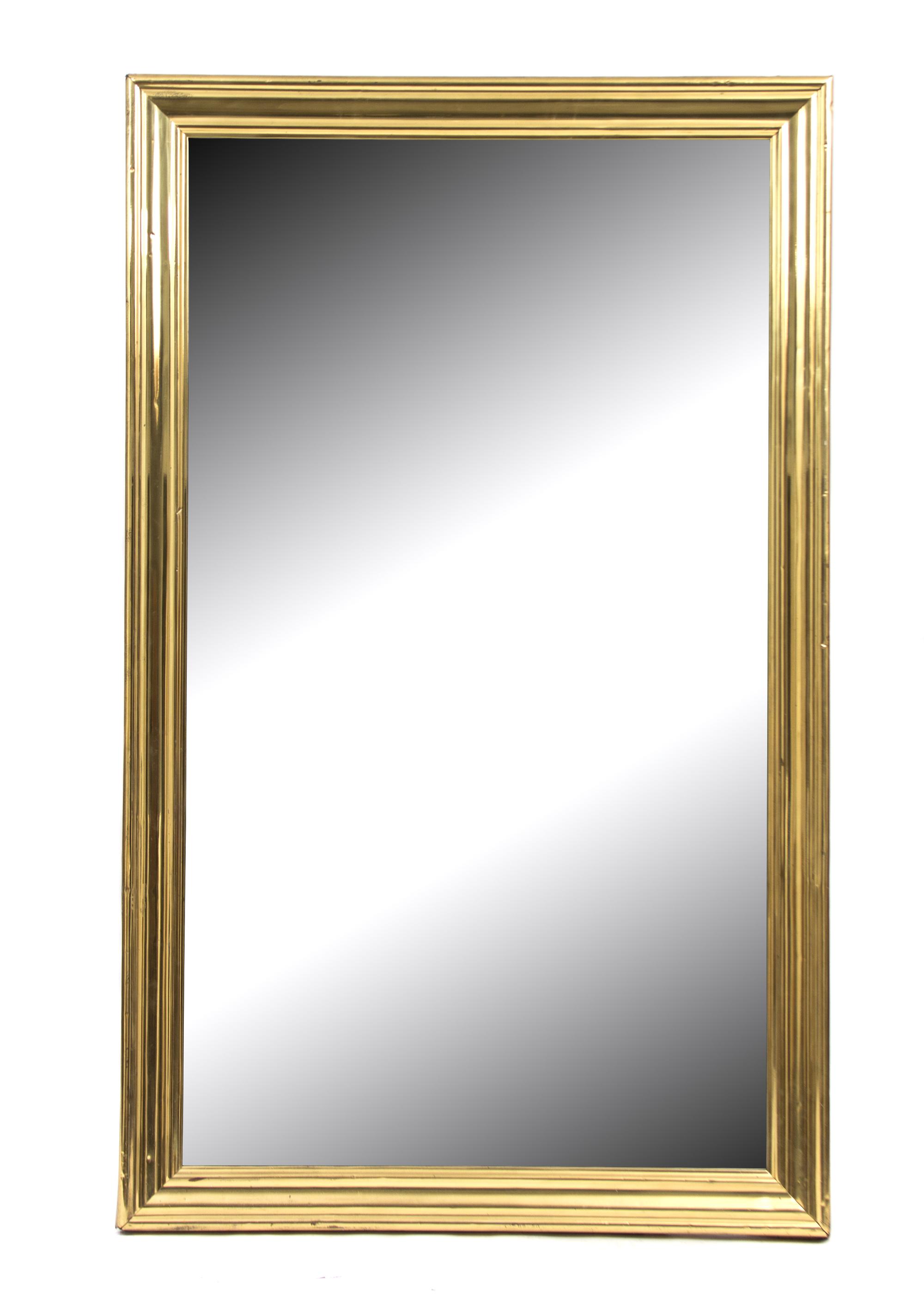 A Large Brass Framed Mirror Height 70 1/2 x width 43 inches. — 20TH CENTURY