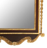 A George III Style Parcel Gilt Mahogany Mirror