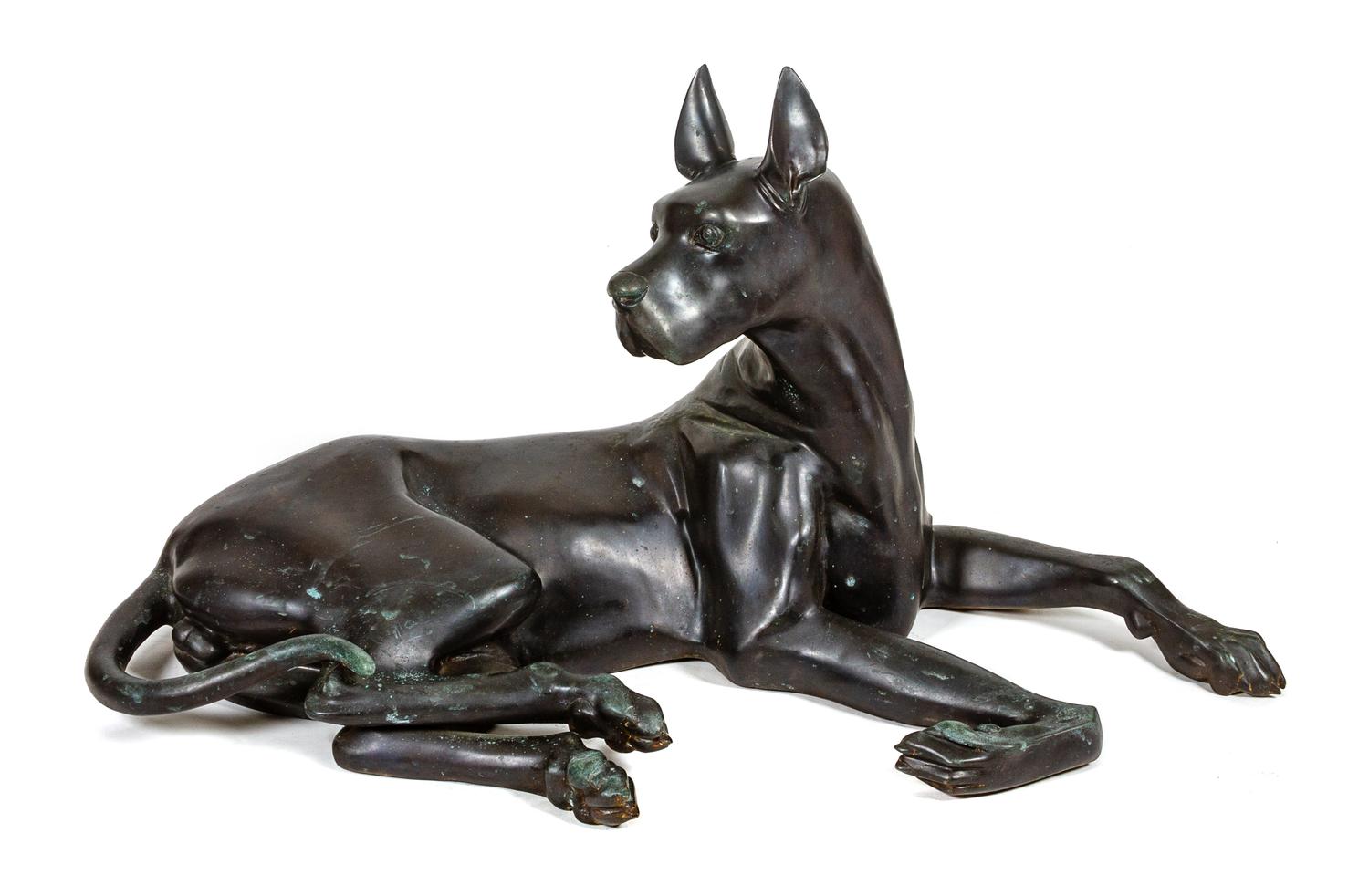A Large Bronze Great Dane Sculpture Height 25 x width 47 x depth 22 inches.