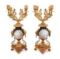 A Pair of Gilt Metal Mounted Sèvres Style Four-Light Candelabra