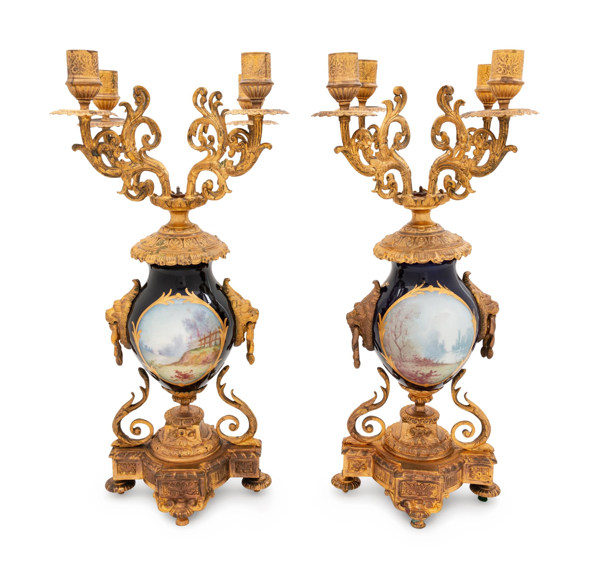 A Pair of Gilt Metal Mounted Sèvres Style Four-Light Candelabra