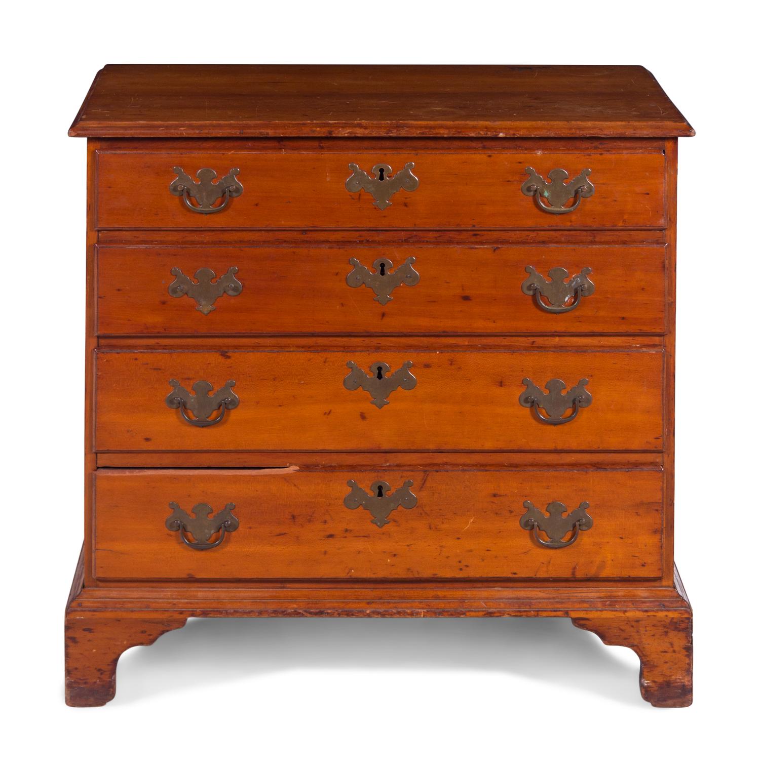 A Chippendale Style Cherry Chest of Drawers