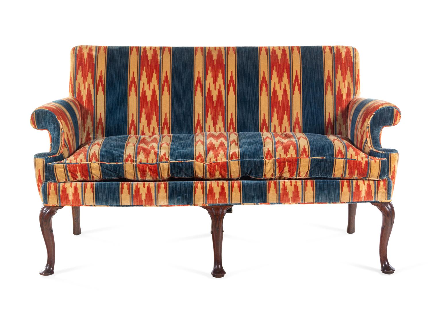 A George II Carved Walnut Sofa