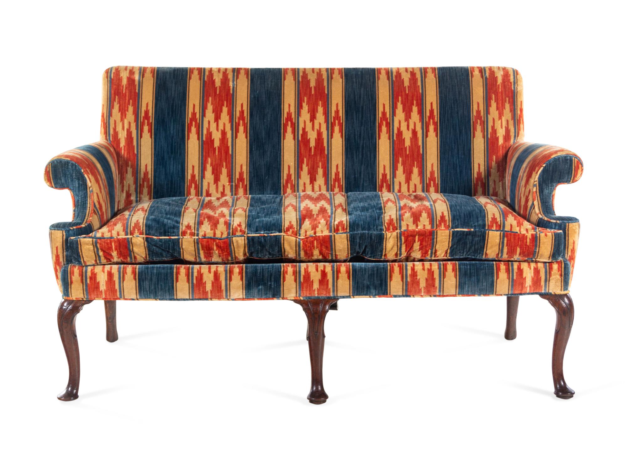A George II Carved Walnut Sofa