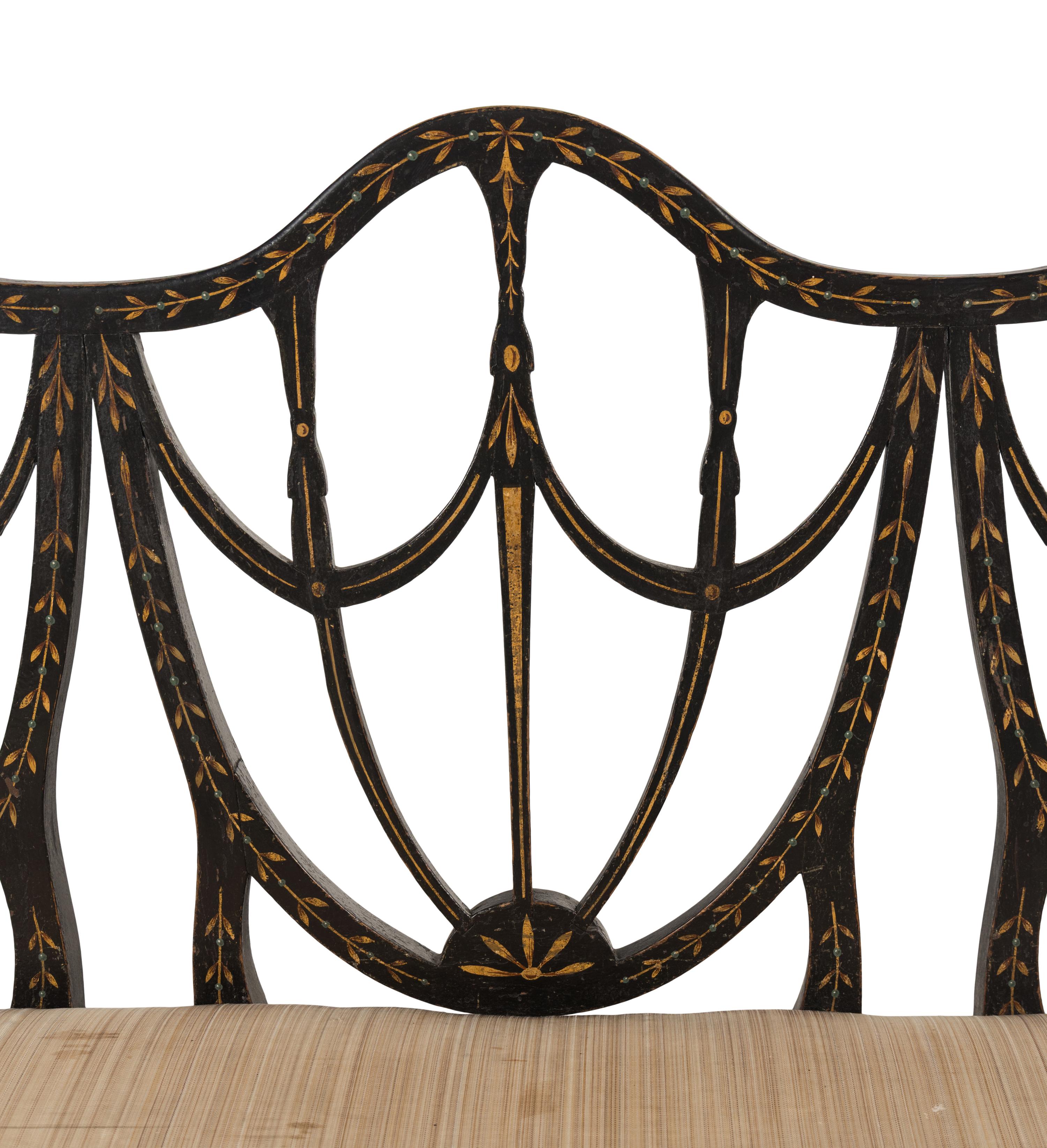 A George III Painted Beechwood Triple-Back Settee