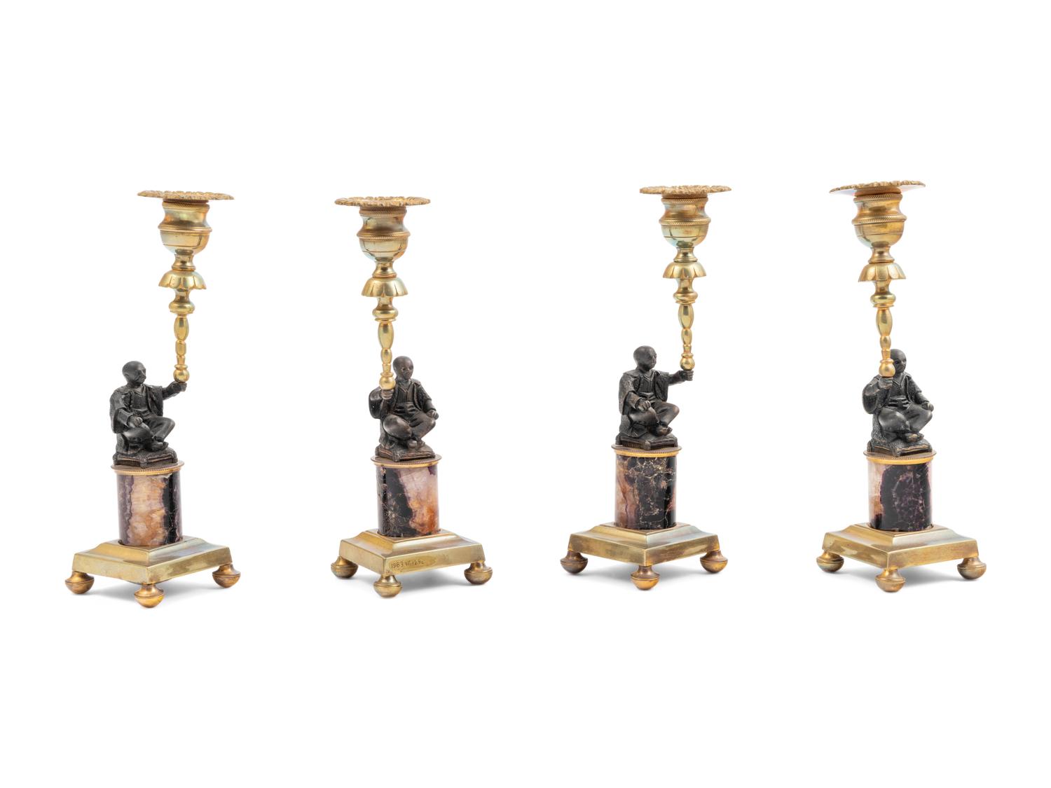 A Set of Four Gilt Metal and 'Blue John' Figural Candlesticks