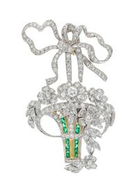 An 18 Karat White Gold, Diamond and Emerald Pendant/Brooch, 8.40 dwts.