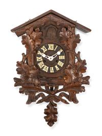 A Black Forest Carved Cuckoo Clock