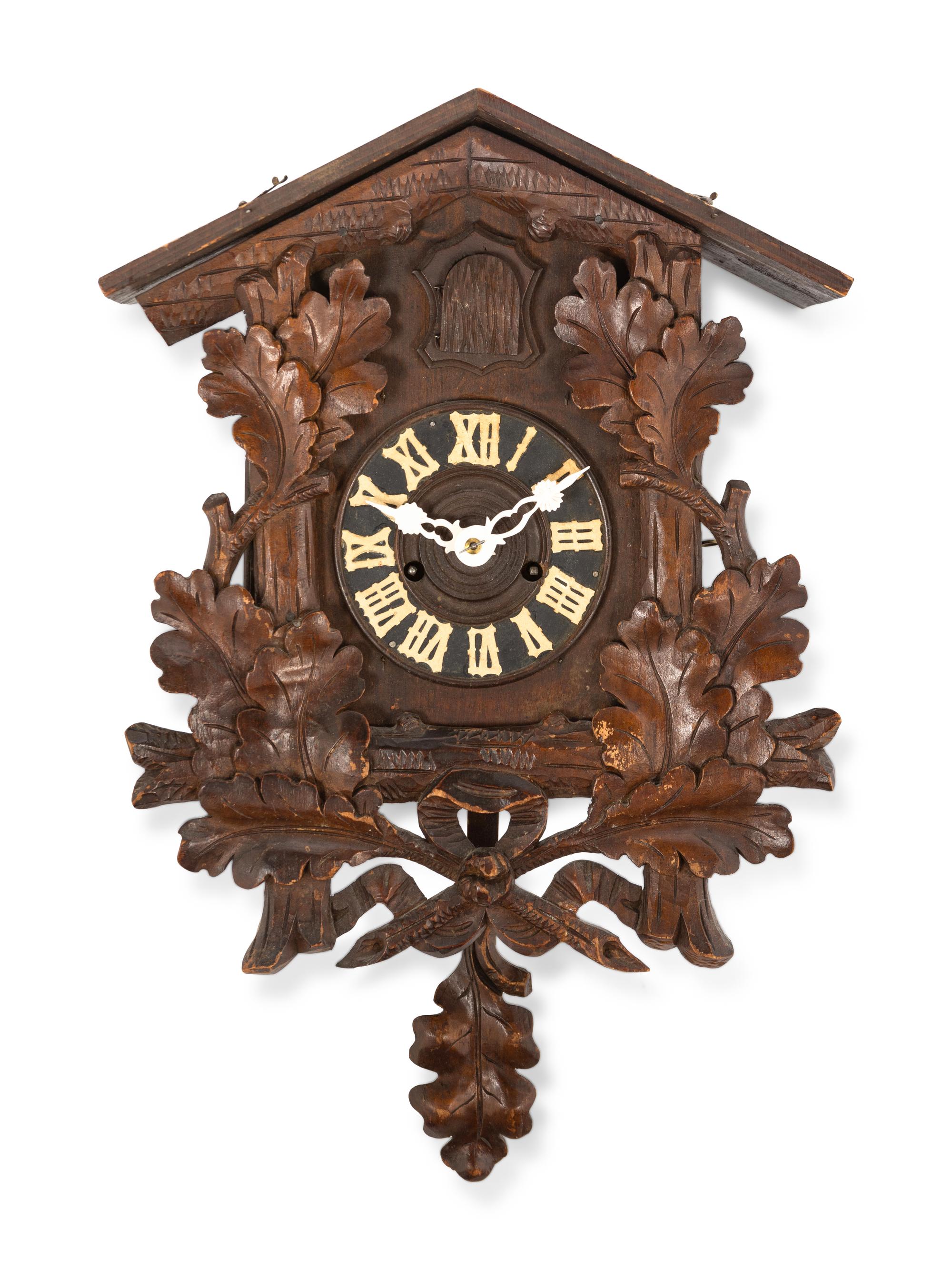 A Black Forest Carved Cuckoo Clock