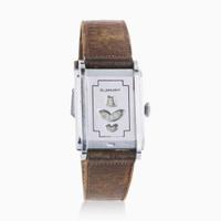 A Collection of Two Men's Rings and Wristwatch