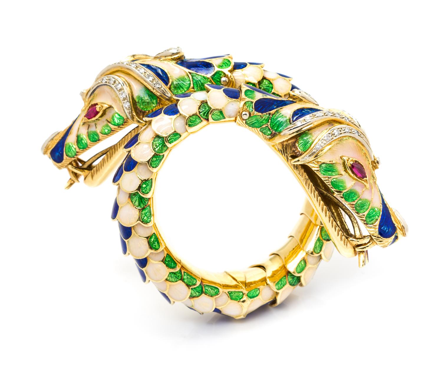 A Fine Vintage 18 Karat Yellow Gold, Diamond, Ruby and Polychrome Enamel Twin Chimera Bracelet, 89.70 dwts.