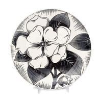 A Group of Six Ceramic Plates